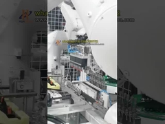 Cella di inserimento a doppia pinza per robot per l'assemblaggio di parti per autoveicoli